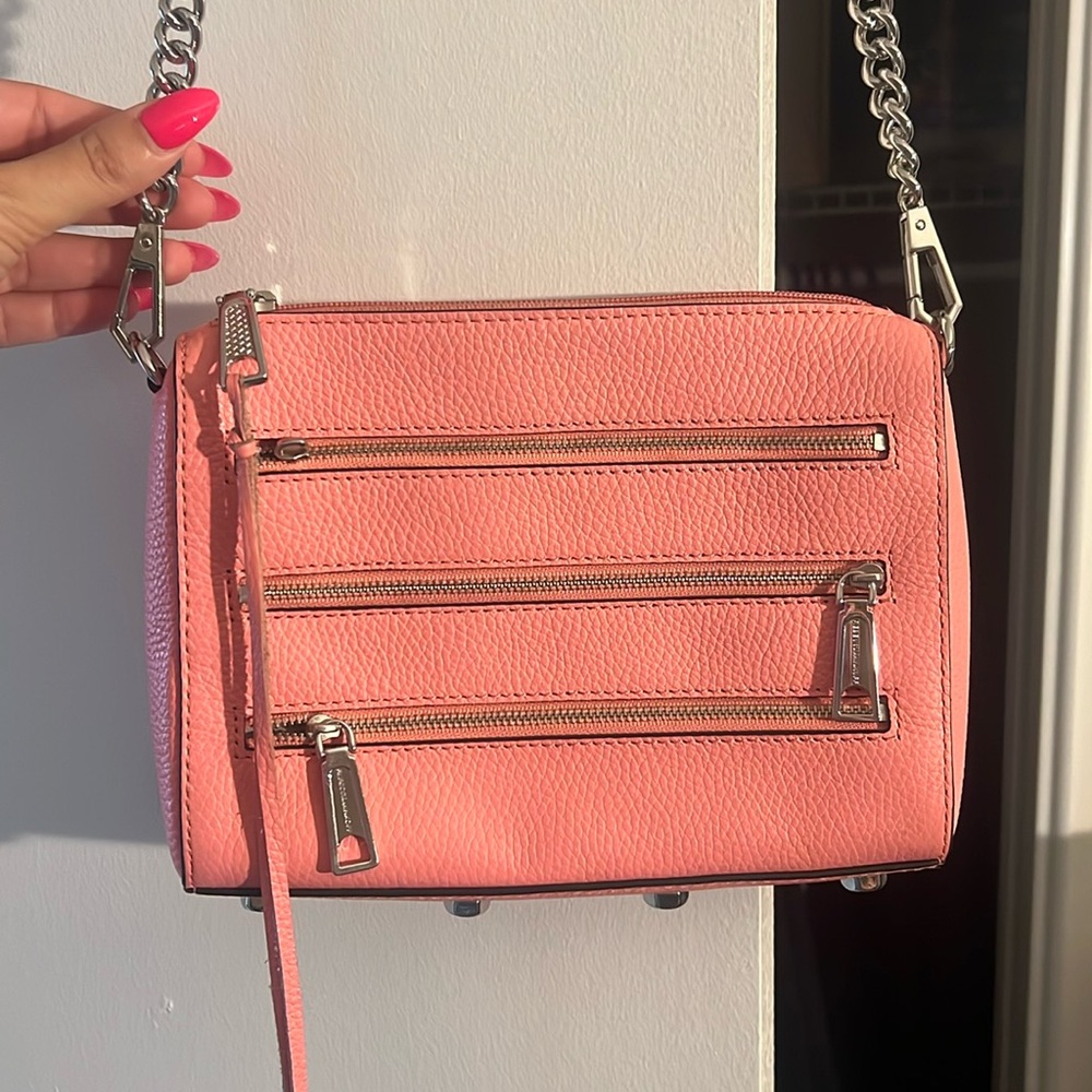 Rebecca Minkoff pink purse with silver chain.